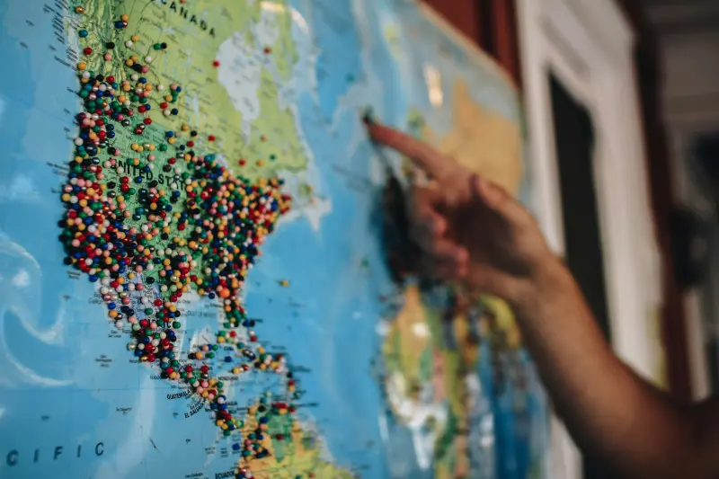 A world map focused on america with a variety of pins added