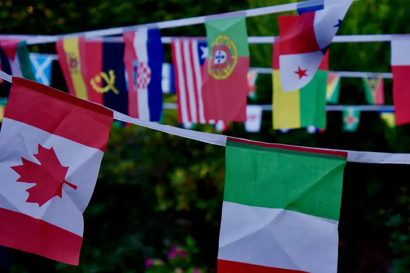 Multiple country flags displayed on a line